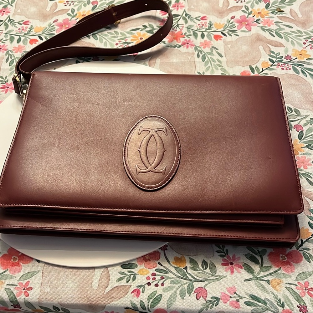 CARTIER messenger bag color: burgundy 
VINTAGE